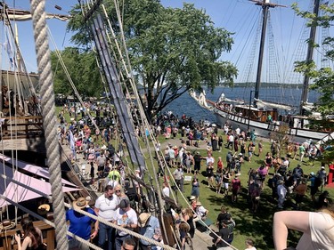 The crowd on Blockhouse Island Saturday is seen from the deck of the Nao Trinidad. (RONALD ZAJAC/The Recorder and Times)