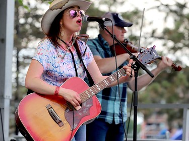 Jessica Lavallee performs on the main stage Sunday. In the background is fiddler Wade Foster. (RONALD ZAJAC/The Recorder and Times)