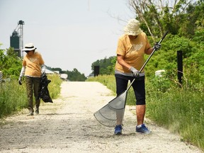 Dianne Flook, left, and Beverly Van Dyken with the Chatham-Kent Trails Council volunteer to clean up the CASO Trail in Ridgetown June 1, 2022. (Tom Morrison/Postmedia Network)