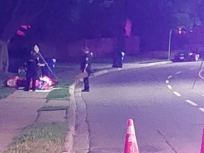 Chatham-Kent police report a 48-year-old Chatham man sustained life-treatening injuries in a motorcycle crash that occurred on Baldoon Road in Chatham Sunday night. Police are seen here investigation the crash. PHOTO Ellwood Shreve/Chatham Daily News