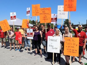 Union members of Unifor Local 999 were on the picket line with family members last Saturday at the Enbridge Gas Dawn Hub. After spending three weeks on strike, members voted in favour of ratifying a new four-year contract on Monday. PHOTO Carl Hnatyshyn/Postmedia