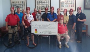 Members of the Achom Shrine Club in Chatham recently donated $15,000 to the Kilometers For Kids cycling fundraiser to benefit the Shriner's Hospital for Children in Montreal.  (Ellwood Shreve/Chatham Daily News)