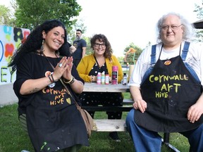 Organizer Yaffa Goawily, Rachel Chainey of Concordia University and Richard Salem of Your Arts Council at the colouring board event at Lamoureux Park on Saturday May 28, 2022 in Cornwall, Ont. Laura Dalton/Cornwall Standard-Freeholder/Postmedia Network