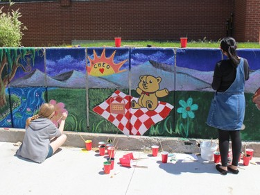 A CHEO bear picnic mural coming along well. Photo on Friday, June 3, 2022, in Cornwall, Ont. Todd Hambleton/Cornwall Standard-Freeholder/Postmedia Network