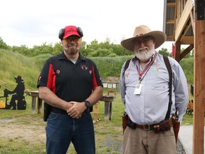 From left: Jim Devine, chief range officer and Cornwall Handgun Club president Bruce Overbury in front of cowboy themed range two on Saturday June 4, 2022 in Bonnville, Ont. Laura Dalton/Cornwall Standard-Freeholder/Postmedia Network