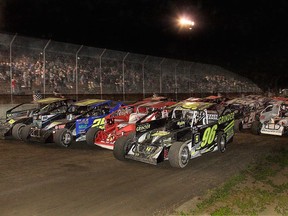 Cars lined up four-wide along the front straightaway at Cornwall Motor Speedway. Handout/Cornwall Standard-Freeholder/Postmedia Network