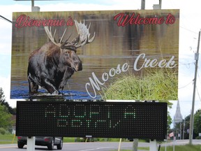 A welcome road sign to Moose Creek, with digital signage promoting a community hall fundraiser.  Photo taken Friday, June 10, 2022 in Moose Creek, Ont.  Todd Hambleton/Cornwall Standard-Freeholder/Postmedia Network