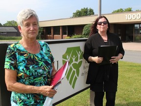 Nation Rise Wind Farm opponents Ruby Mekker (left) and Tammy McRae outside the Eastern Ontario Health Unit facility in Cornwall on Thursday morning. Photo on Thursday, June 16, 2022. Todd Hambleton/Cornwall Standard-Freeholder/Postmedia Network