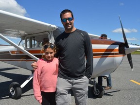 From left, Maya and Shawn Maloney about to take off on a Father's Day flight at the fly-in breakfast on Sunday June 19, 2022 in South Glengarry, Ont. Shawna O'Neill/Cornwall Standard-Freeholder/Postmedia Network