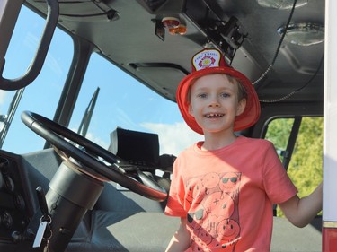 Hudson Grignon was super excited to climb behind the wheel of a Cornwall fire truck on Tuesday June 28, 2022 in Cornwall, Ont. Shawna O'Neill/Cornwall Standard-Freeholder/Postmedia Network