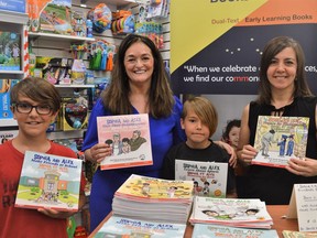 From left to right: Alex Terriah, author Denise Bourgeois-Vance, Ben Terriah, and Kid's Korner owner Leslie Ouderkirk at Bourgeois-Vance's book signing on Wednesday June 29, 2022 in Cornwall, Ont. Shawna O'Neill/Cornwall Standard-Freeholder/Postmedia Network
