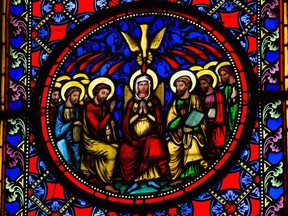 Stained Glass window depicting Pentecost, in Bayeux, Calvados, France. This window was created in the 19th Century.