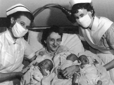 Handout/Cornwall Standard-Freeholder/Postmedia Network
From the Religious Hospitallers of St. Joseph archives, a Standard-Freeholder photo of the first triplets born at Hotel Dieu in 1959, to Bertha Ladouceur and her husband Camille. She's seen here with registered nurse Veronica Ezard, left, and student Heather MacPherson. The infants were named Donald, Donna, and Ronald.