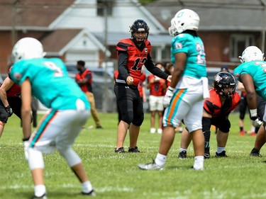 Cornwall Wildcats quarterback Xavier Uhr calling the play against the Durham Dolphins on Saturday June 4, 2022 in Cornwall, Ont. The Wildcats won 32-0. Robert Lefebvre/Special to the Cornwall Standard-Freeholder/Postmedia Network