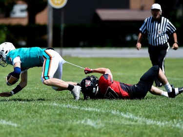 A Cornwall Wildcats player makes the tackle on a Durham Dolphins player during play on Saturday June 4, 2022 in Cornwall, Ont. The Wildcats won 32-0. Robert Lefebvre/Special to the Cornwall Standard-Freeholder/Postmedia Network