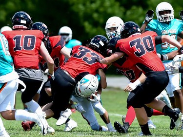 Cornwall Wildcats Noah Levesque (No. 30) tackles a Durham Dolphon during play on Saturday June 4, 2022 in Cornwall, Ont. The Wildcats won 32-0. Robert Lefebvre/Special to the Cornwall Standard-Freeholder/Postmedia Network