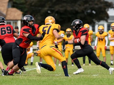 Cornwall Wildcats Mason Wilson, with possession, running to get the down during play against the Kingston Jr. Gaels, on Saturday June 18, 2022 in Cornwall, Ont. Cornwall lost 34-23. Robert Lefebvre/Special to the Cornwall Standard-Freeholder/Postmedia Network