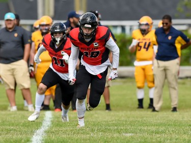 Cornwall Wildcats players Ryan Stephens and Evan Cordingly run up the sideline during play against the Kingston Jr. Gaels, on Saturday June 18, 2022 in Cornwall, Ont. Cornwall lost 34-23. Robert Lefebvre/Special to the Cornwall Standard-Freeholder/Postmedia Network