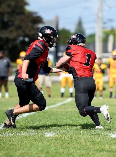 Cornwall Wildcats Xavier Uhr makes the handoff to Mason Wilson during play against the Kingston Jr. Gaels, on Saturday June 18, 2022 in Cornwall, Ont. Cornwall lost 34-23. Robert Lefebvre/Special to the Cornwall Standard-Freeholder/Postmedia Network