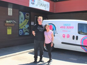 Paul Hopfner and Abbey Claro outside their new ‘Abbey’s Creations’ ice cream shop in the historic downtown. Patrick Gibson/Cochrane Times