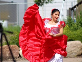Kat Arellano, a dancer representing Peru,  performs at the Multiculturalism Day, hosted by the Multicultural Association of Wood Buffalo, at Fort McMurray Heritage Village on Saturday, June 11, 2022. Laura Beamish/Fort McMurray Today/Postmedia Network