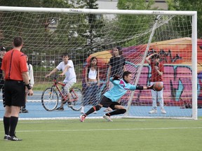 Holy Trinity's keeper makes a save during the high school soccer finals. Supplied image