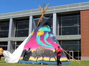 The tipi in unveiled at the Burgers and Bannock in the Park event celebrating National Indigenous Peoples Day at MacDonald Island Park on Tuesday, June 21, 2022. Laura Beamish/Fort McMurray Today/Postmedia Network