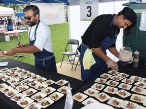 People from the Regional Recreation Corporation serve desserts at the Taste of Fort McMurray, as part of the Fort McMurray Food Festival, at Heritage Village on Saturday, July 27, 2019. Vincent McDermott/Fort McMurray Today/Postmedia Network ORG XMIT: POS1908121601373501