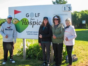 Organizers from Golf Fore Hospice celebrate last year's event. The 2022 charity best ball event will be held on the longest day of the year, June 21.