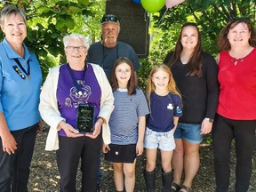 Faye Moore stands with members of her family after receiving the Hanover Chamber of Commerce Lifetime Achievement for Community Service Award. Front left are daughter Nancy Mellish, Faye Moore, great-granddaughters Isabelle and Julia, granddaughter Natasha Chalmers and daughter Sara Ruetz. In back is Faye's son Dan Cox. Absent are Moore's daughter Jennifer Swindlehurst and granddaughter Dr. Courtney Mellish.