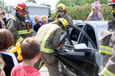 Firefighters and paramedics conduct an extrication demonstration, including use of the jaws of life, in Chelmsford, Ontario on Saturday, June 11, 2022. Ben Leeson/The SUdbury Star/Postmedia Network