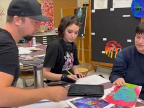 Teacher Shane Goudreau working with some of the students from the class at Gananoque Intermediate and Secondary School.  Supplied by Gananoque Business Improvement Area