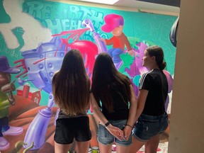 Students on a field trip to an artist’s studio where they could learn more about the process of creating murals. Supplied by Gananoque Business Improvement Area