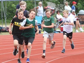 Runners take part in the atom boys 800 metres at the Limestone Elementary Schools Athletic Association track and field championships at CaraCo Home Field on Wednesday, June 8, 2022.
