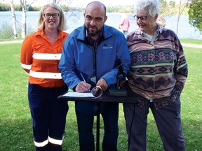 Photo by KEVIN McSHEFFREY
Kate Sommerville - BHP general manager of legacy assets for North America, Elliot Lake Mayor Dan Marchisella and Marg Reckhan - Penokean Hills Field Naturalists president, signed a new Shared Stewardship Agreement in May for the Sherriff Creek Bird Sanctuary.