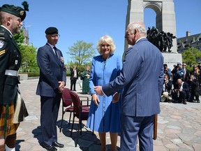 1.	Corporal Greg Gilbert, 2nd Battalion of the Irish Regiment of Canada and long-time member of the Espanola Royal Canadian Legion, was selected to participate in a memorial ceremony with Prince Charles and Camilla, the Duchess of Cornwall, at the National War Memorial in Ottawa on May 18, on the second day of the Royal trip to Canada.