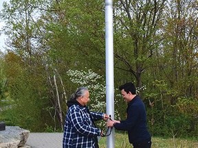 Photo by KEVIN McSHEFFREY
Elliot Lake Pride emperor Steve Meawasige and Serpent River First Nation Ogimma (Chief) Brent Bissaillion raised the two-spirit flag at the Miners Memorial Park to mark the International Day Against Homophobia, Transphobia and Biphobia (IDAHOTB) on May 17.