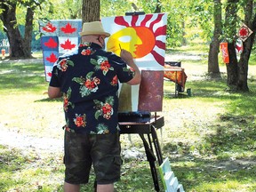 Photo by LESLEY KNIBBS
Outgoing organizer Jayson Stewart painting at the 2020 Art in the Park in Massey.