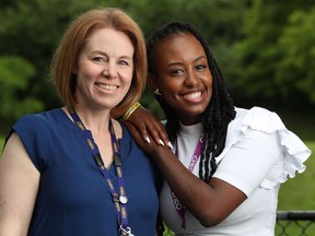 Samantha Muhoza, right, recently reunited with Leigh Banfield after starting a new job as a social worker with CHEO.