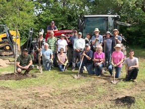On June 13, a team of community volunteers with the help of some donated equipment planted 26 new specimen trees at the new Pembroke Waterfront Arboretum.
