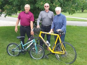 Bike Bank volunteers Howard Metcalfe and Drew Mellon, of Beachburg, and Pat Krose of Forester's Falls.