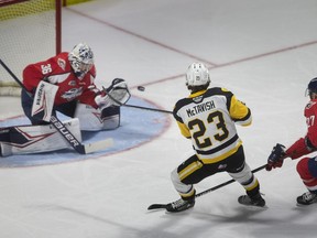 WINDSOR, ONTARIO:. JUNE 13, 2022 - Hamilton's Mason McTavish takes a shot wide of the net against Windsor's Mathias Onuska in game 6 of the OHL finals between the Windsor Spitfires and the Hamilton Bulldogs at the WFCU Centre, on Monday, June 13, 2022.