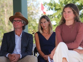 Hometown Olympian Madeleine Kelly (right) received the key to the city of Pembroke in a ceremony Sept. 5, 2021 at the Riverwalk Amphitheater in Pembroke.  Looking at her parents, Chris and Caroline Kelly.  Anthony Dixon