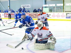 Noah Zeppa of the Soo Thunderbirds, turning aside a scoring chance by the Sudbury Cubs during the 2021-2022 NOJHL season. NOJHL.COM