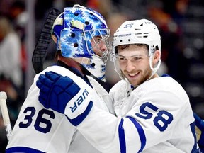 Toronto Maple Leafs left winger Michael Bunting celebrates with goaltender Jack Campbell following a win against the Anaheim Ducks at Honda Center in November 2021. GARY A. VASQUEZ/USA TODAY SPORTS