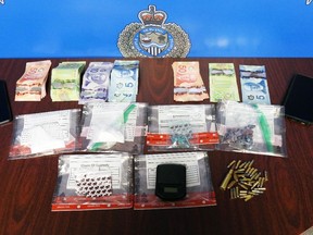 Officers found nearly 30 grams of blue and purple fentanyl, about 10 grams of blue fentanyl, almost 20 grams of cocaine, more than six grams of crystal meth, and $1,500 in cash during an investigation June 8-9, 2022. (Sarnia police)