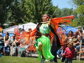 Jeannna Prosper of Petawawa dances Saturday on the opening day of the Aamjiwnaang First Nation Powwow. (Paul Morden / The Observer)