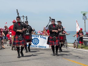 Forest Legion Pipe Band members march in the Bright's Grove Canada Day parade June 25. The Bright's Grove Optimist Club event is an annual tradition one week before July 1. (Jayne Primeau photo)