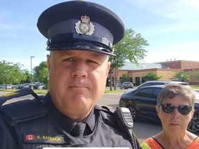 West Region OPP Acting Sgt Ed Sanchuk and school crossing guard Kim Feere urge drivers to pay attention in school zones after a family's dog was injured by a vehicle on Donly Drive South in Simcoe on Monday morning. OPP TWITTER