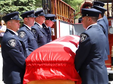 Pallbearers carry the casket of Greater Sudbury firefighter Mike Frost at a funeral service in downtown Sudbury, Ont. on Wednesday June 1, 2022. John Lappa/Sudbury Star/Postmedia Network